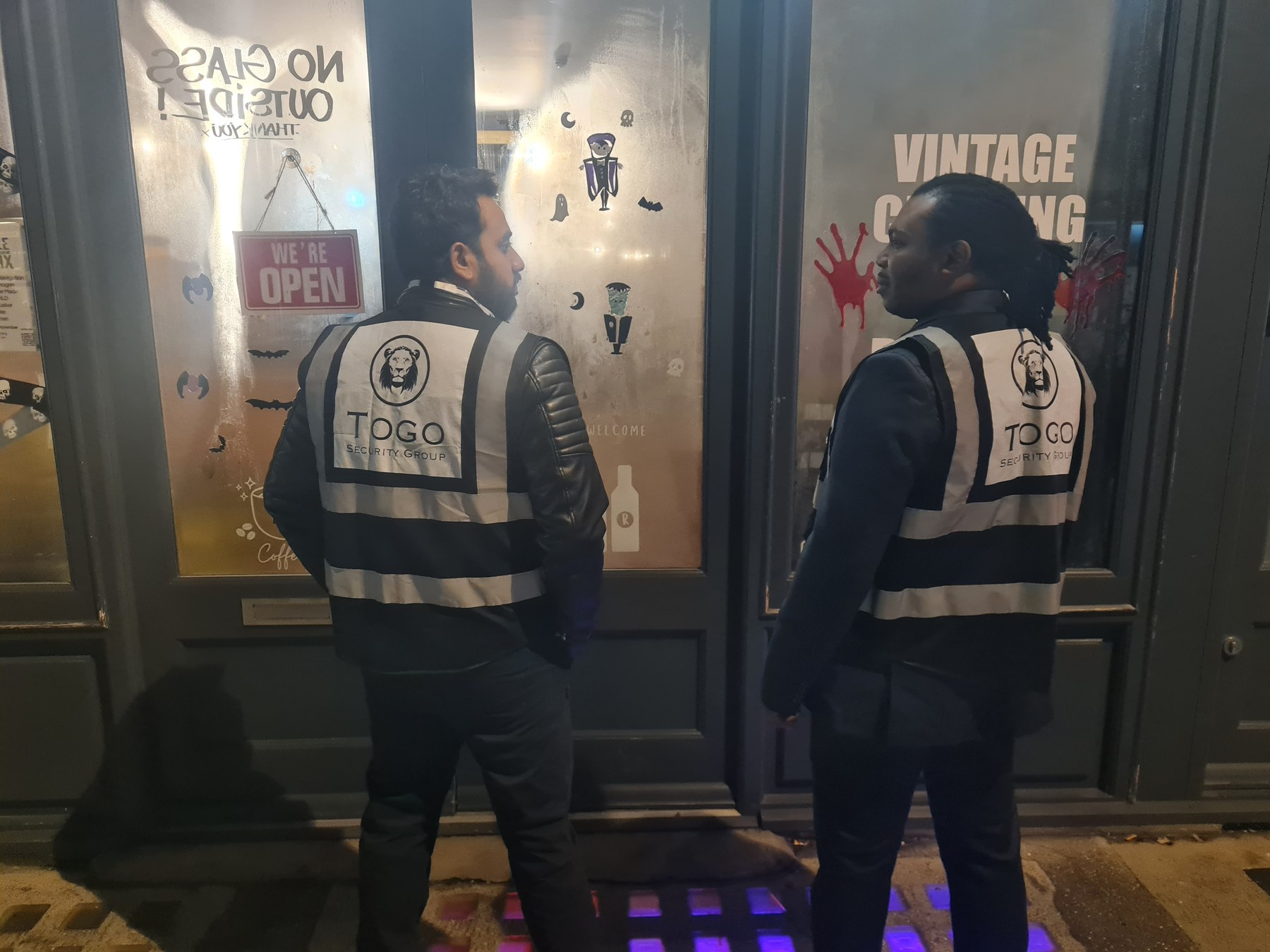 Togo Security team members wearing branded security vests