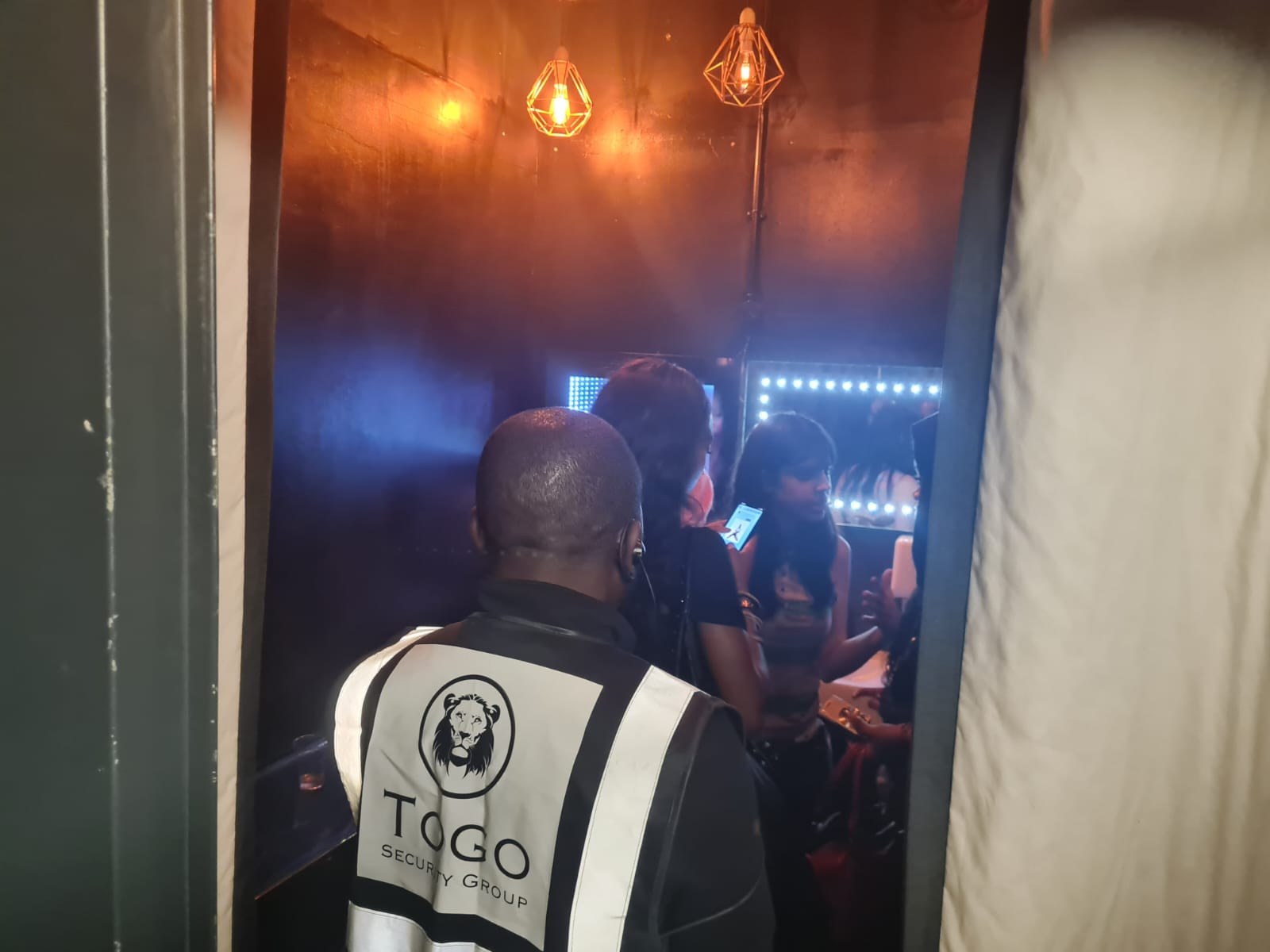 Togo Security operative at a venue doorway